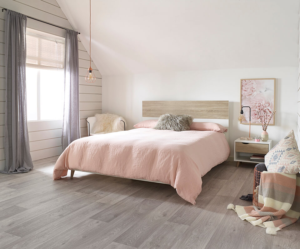 Memory Foam Warehouse's mattress dressed in a pastel pink