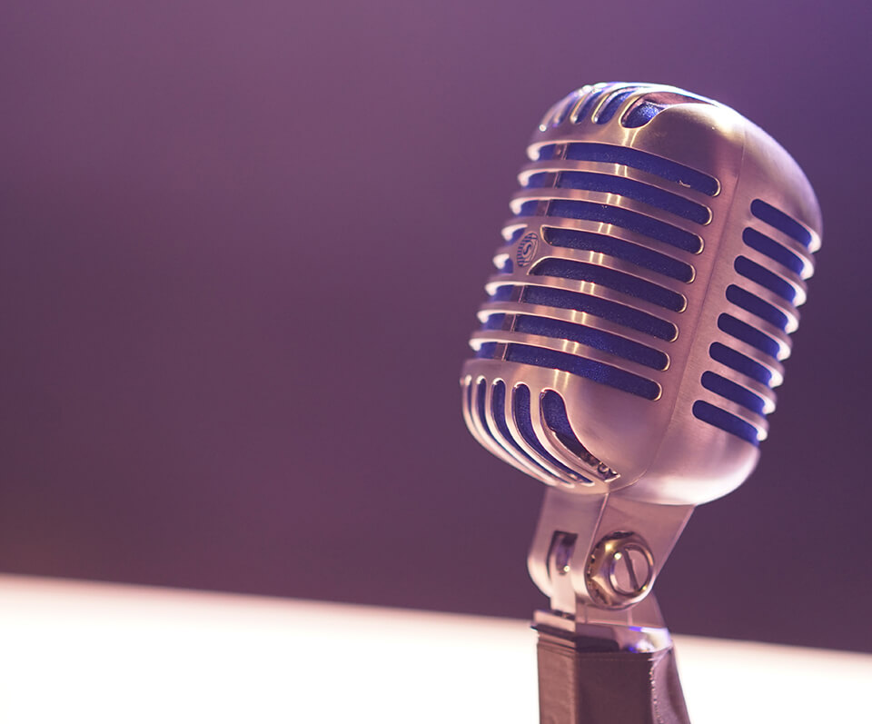 Microphone stand in place for MoveiQ to launch their brand new podcast