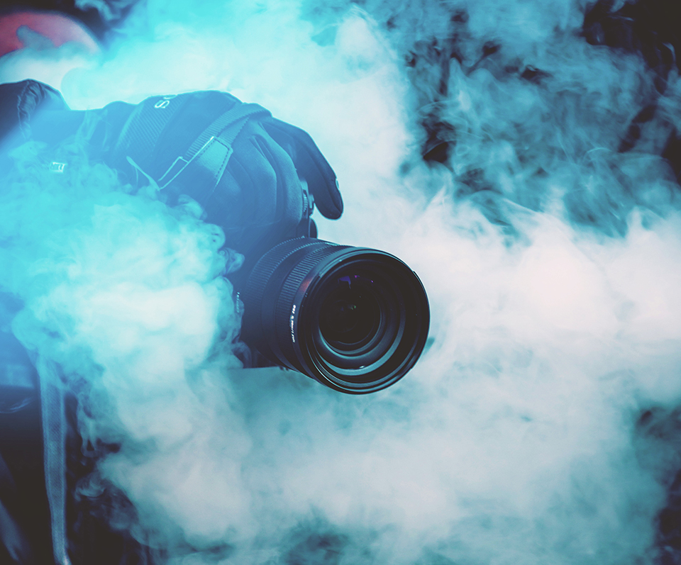 RotorVideo: a camera visible through a smokey room, recording the action